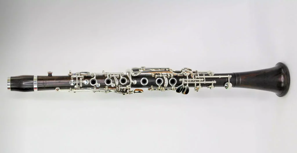 A professional clarinet of dark African leadwood.